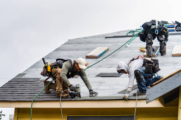 Professional Gutter Installation technician working in Mc Henry, KY